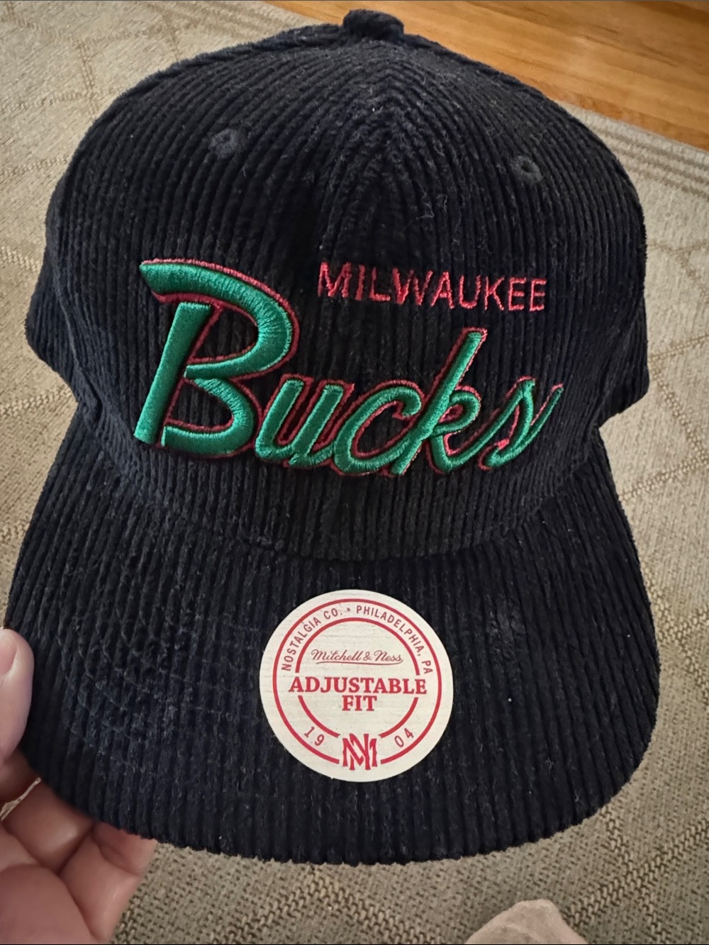 Milwaukee Bucks Black Corduroy Snapback Hat with Green Embroidery